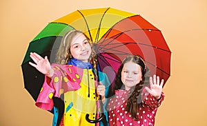 Autumn fashion. rain protection. Rainbow. cheerful hipster children, sisterhood. happy little girls with colorful