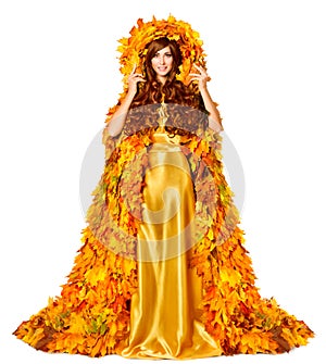 Autumn Fashion Woman in Yellow Dress and Coat of Maple Leaves. Model in Creative Fantasy Long Gown in Hood. Fall Season Beauty