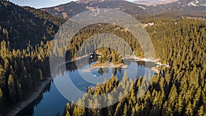 Autumn Forest Lake Laax Mountains Above Caumasee Switzeland Aerial 4k