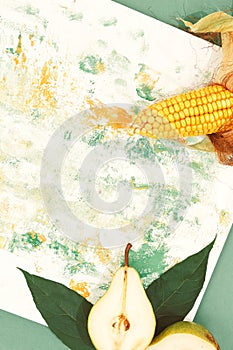 Autumn fresh decor Corn and pear on design painted background. Minimal art. Autumn eco bio life concept