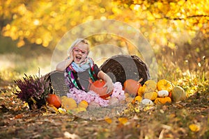 Autumn girl with pumpkin