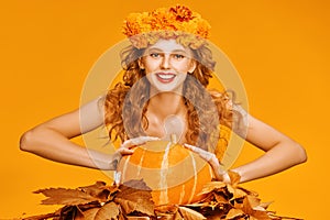 Autumn girl with pumpkin