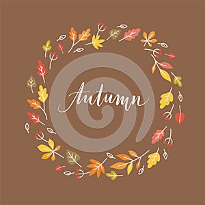 Autumn handwritten inscription in autumn leaves wreath on dark background. Cute greeting card design. - Vector illustration