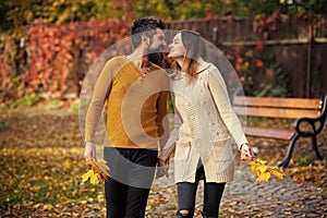 Autumn happy couple of girl and man outdoor.