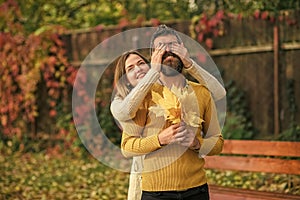 Autumn happy couple of girl and man outdoor. Love relationship and romance. Couple in love in autumn park. Nature season