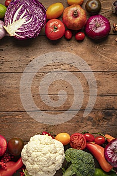 Autumn harvest, fruits and vegetables. copy space concept vertical frame on a wooden table flatlay top view