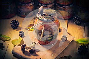 Autumn harvest mushrooms marinated vegetables jars