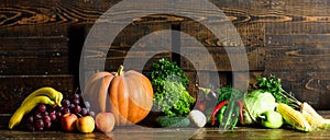 Autumn harvest organic crops pumpkin corn vegetables. Vegetables from garden or farm close up. Homegrown vegetables