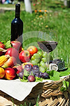 Autumn harvest: seasonal fruits and red wine