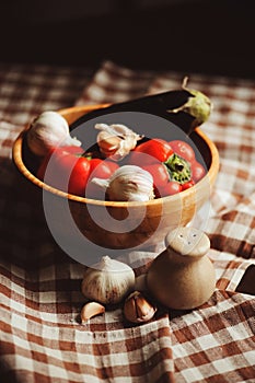 Autumn harvest vegetables, home growth onion and garlic picked up from farm in rustic tray