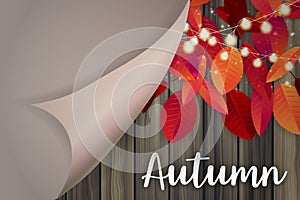 Autumn illustration concept. Peeling off wrapping paper over wooden plank wall with red abd orange leaves and glowing lights garla