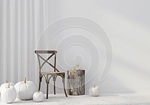 Autumn interior with vintage wicker chair and white pumpkins