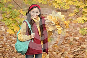 autumn kid fashion. romantic season for inspiration. happy childhood. back to school. teenage girl with backpack hold
