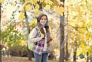 autumn kid fashion. romantic season for inspiration. happy childhood. back to school. teenage girl with backpack relax