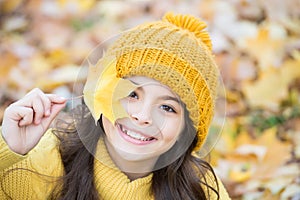 Autumn knitted fashion. romantic season for inspiration. happy childhood. teenage girl relax in park. fall season beauty