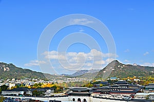 Autumn of Korean tradition architectural of Gyeongbokgung palace and modern building cityscpae modern office view background,
