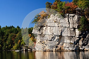 Autumn Lake and Mountain Cliffs