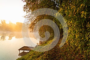 Autumn lake in soft warm lights