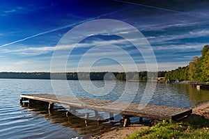 Autumn lake on a sunny day, water mirror