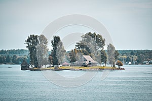 Autumn landscape in the 1000 islands. Houses, boats and islands. Lake Ontario, Canada USA