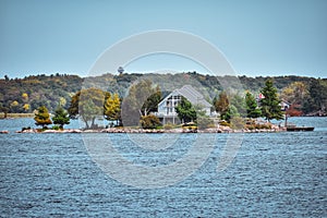 Autumn landscape in the 1000 islands. Houses, boats and islands. Lake Ontario, Canada USA