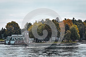 Autumn landscape in the 1000 islands. Houses, boats and islands. Lake Ontario, Canada USA