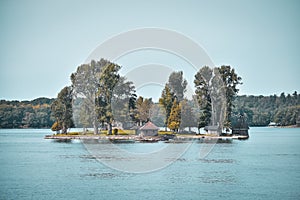 Autumn landscape in the 1000 islands. Houses, boats and islands. Lake Ontario, Canada USA