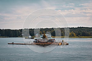 Autumn landscape in the 1000 islands. Houses, boats and islands. Lake Ontario, Canada USA