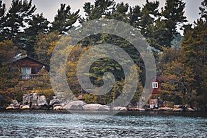 Autumn landscape in the 1000 islands. Houses, boats and islands. Lake Ontario, Canada USA