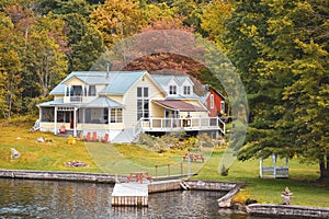 Autumn landscape in the 1000 islands. Houses, boats and islands. Lake Ontario, Canada USA