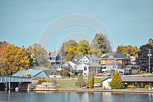 Autumn landscape in the 1000 islands. Houses, boats and islands. Lake Ontario, Canada USA