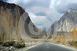 Autumn landscape background with fall colours trees in northern areas of Pakistan