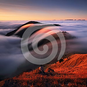 Autumn landscape, beautiful sunrise above the heavy clouds, Mountain sea