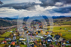 The autumn landscape of Bialka Tatrzanska village with a view of the Tatra Mountains. Poland