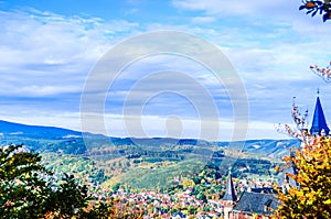 Autumn landscape with castle of Wernigerode in Germany