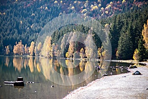 Autumn landscape with colorful sunrise, St Ana Lake, Transylvania, Romania