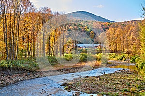 Autumn landscape with farm with barn