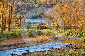 Autumn landscape with farm with barn