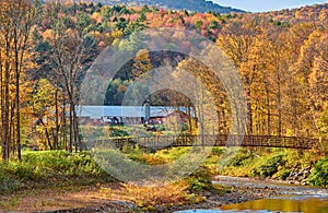 Autumn landscape with farm with barn