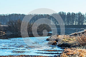 Autumn landscape, frosty morning by the river. Western Siberia