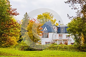 Autumn landscape with a house
