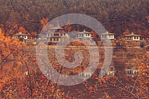 Autumn landscape with lake and houses, Bulgaria