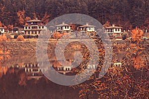 Autumn landscape with lake and houses, Bulgaria