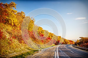 Autumn landscape with mountain road turn