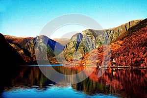 Autumn landscape with Norwegian fiords and evening sun photo