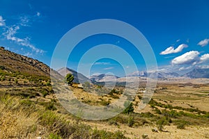 Autumn landscape panoramic view of Balkan Albanian Mountains close to the Saranda on sunny day. Saranda, Albania