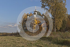 Autumn landscape with the restored Church of the Nativity of the Blessed Virgin in the village of Zhavoronkovo, Verkhovazhsky