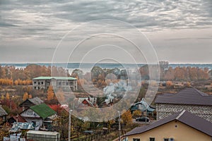 Autumn landscape with smoke