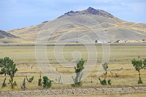 Autumn landscape, steppe with mountains. prairie, veld, veldt. a