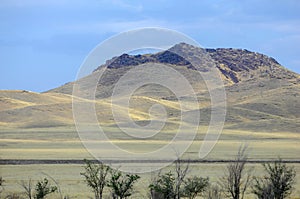 Autumn landscape, steppe with mountains. prairie, veld, veldt. a